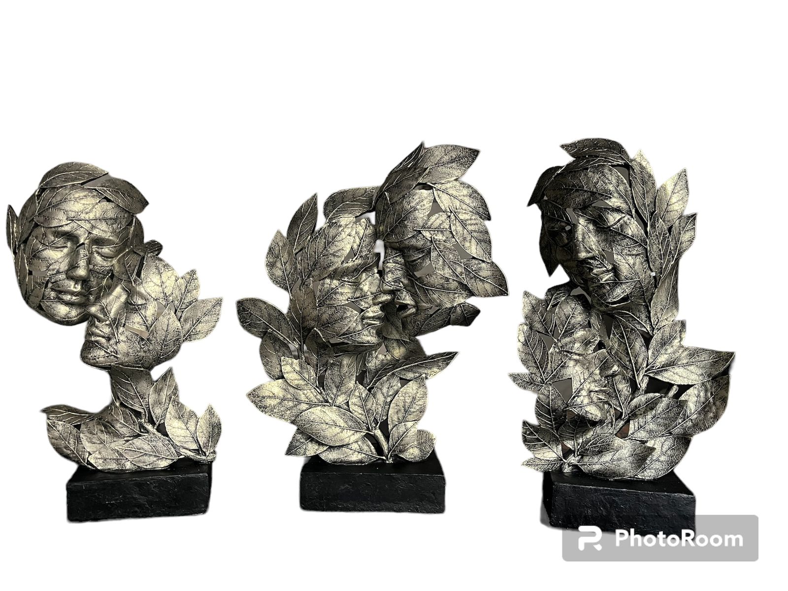 Three Unique Faces Statue